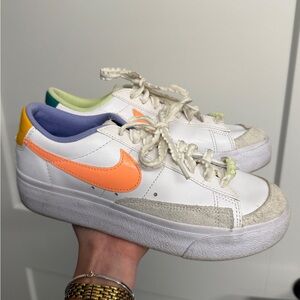 Nike White Sneakers with Orange and Yellow Accents